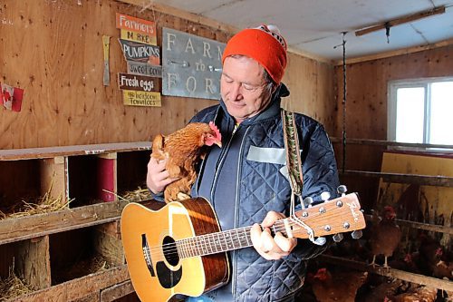 Canstar Community News Russell Loewen records a song in his hen house daily to send to his grandkids. Recently, he's been uploading them to YouTube. He's pictured in his hen house on Feb. 17. (GABRIELLE PICHÉ/CANSTAR COMMUNITY NEWS/HEADLINER)