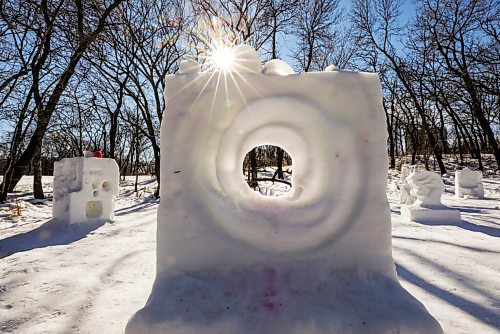 RUTH BONNEVILLE / WINNIPEG FREE PRESS 

Local Weather Standup 
Morier Park snow sculptures

A burst of sunlight, like a camera flash, pokes it's light through the trees onto a snow sculpture made in the shape of an old camera near Morier Park Monday.  A collection of snow sculptures including a large, open hand can be seen near the park on the banks of the Seine River. 

Feb 22, 2021
