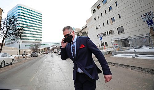 RUTH BONNEVILLE / WINNIPEG FREE PRESS 

Local - Patrol Sgt. Sean Cassidy

Patrol Sgt. Sean Cassidy rushes across Kennedy Street after leaving the side doors of the Law Courts Building after his hearing Monday. 

Police chief Danny Smyth was forced into the spotlight last month when one of his officer was charged with three criminal offences this week  bringing the total numbers of charges the cop is facing to six.

Manitobas police watchdog charged Patrol Sgt. Sean Cassidy with fraud, obstruction of justice and unauthorized access to a police computer system Monday. Cassidy was already facing charges of assault causing bodily harm and two firearm offences.

The Winnipeg Police Service veteran, who has spent more than two decades on the force, is currently on paid administrative leave.

See Dean Pritchard story. 

Feb 22, 2021
