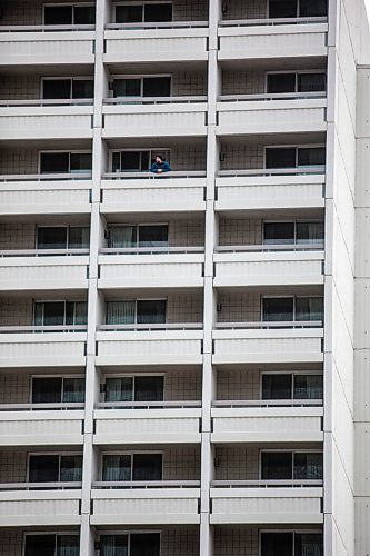 MIKAELA MACKENZIE / WINNIPEG FREE PRESS

Reporter Ben Waldman looks out from his balcony on the 16th floor of the Delta, the city's largest hotel, in Winnipeg on Monday, Feb. 22, 2021. For Ben Waldman story.

Winnipeg Free Press 2021