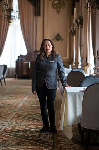 MIKAELA MACKENZIE / WINNIPEG FREE PRESS

Hotel Fort Garry breakfast attendant Elizabeth Pagarigan poses for a portrait in the dining area in Winnipeg on Tuesday, Feb. 23, 2021. For Ben Waldman story.

Winnipeg Free Press 2021