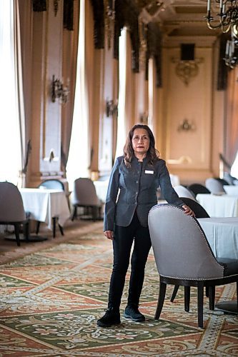 MIKAELA MACKENZIE / WINNIPEG FREE PRESS

Hotel Fort Garry breakfast attendant Elizabeth Pagarigan poses for a portrait in the dining area in Winnipeg on Tuesday, Feb. 23, 2021. For Ben Waldman story.

Winnipeg Free Press 2021