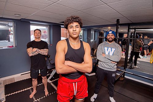 MIKE SUDOMA / WINNIPEG FREE PRESS
15 year old Football star, Dallas Sims, with coaches Brad Black (left) and Nic Demski (right) Tuesday afternoon
February 23, 2021