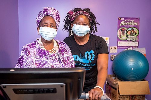 MIKAELA MACKENZIE / WINNIPEG FREE PRESS

Mwaka Kaonga and her mom, Phillis Nachilongo, pose for a photo on the treadmill at their home in Winnipeg on Wednesday, Feb. 24, 2021. For Sabrina Carnevale story.

Winnipeg Free Press 2021