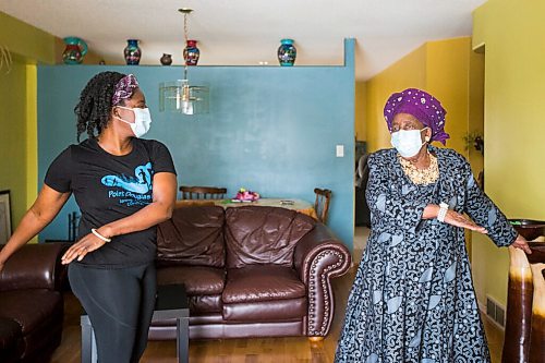 MIKAELA MACKENZIE / WINNIPEG FREE PRESS

Mwaka Kaonga and her mom, Phillis Nachilongo, demonstrate the workout that Phillis has been doing since last year at the start of the lockdown at their home in Winnipeg on Wednesday, Feb. 24, 2021. For Sabrina Carnevale story.

Winnipeg Free Press 2021