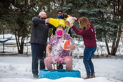 MIKAELA MACKENZIE / WINNIPEG FREE PRESS

Doug Speirs gets ice, water, and snow dumped on him by Special Olympics Manitoba fundraising manager Terry Hopkinson (left), Special Olympics Manitoba athlete Adam Lloyd, and CEO of Special Olympics Manitoba Jennifer Campbell as part of the Virtual Polar Plunge in his backyard in Winnipeg on Wednesday, Feb. 24, 2021. For Doug story.

Winnipeg Free Press 2021