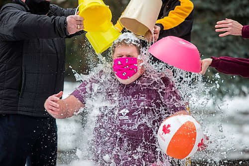 MIKAELA MACKENZIE / WINNIPEG FREE PRESS

Doug Speirs gets ice, water, and snow dumped on him by Special Olympics Manitoba fundraising manager Terry Hopkinson (left), Special Olympics Manitoba athlete Adam Lloyd, and CEO of Special Olympics Manitoba Jennifer Campbell as part of the Virtual Polar Plunge in his backyard in Winnipeg on Wednesday, Feb. 24, 2021. For Doug story.

Winnipeg Free Press 2021