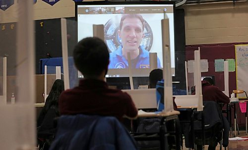 RUTH BONNEVILLE / WINNIPEG FREE PRESS 

LOCAL - space school

Christ the King School grade 7 students  watch Canadian Space Agency astronaut, Joshua Kutryk, via zoom in the school School gymnasium on Wednesday.

ASTRONAUT SCHOOL VISIT: Canadian Space Agency astronaut Joshua Kutryk  speaks to students from Christ the King School in Winnipeg about his job and how he became an astronaut  via Zoom. Sixth graders (now Grade 7 students) at the school won a Junior Astronauts campaign last year that won them a visit from an astronaut, but the event had to be reorganized because of COVID. 

See Maggie's story.

Feb 24, 2021
