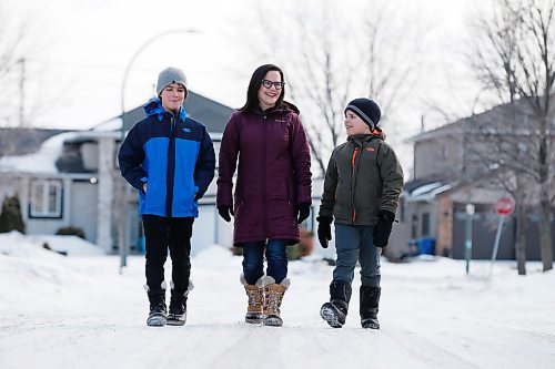 JOHN WOODS / WINNIPEG FREE PRESS
Susan Wingert, a parent and letter writing organizer who is asking the government for more information and data regarding the COVID education dashboard, is photographed with her sons Alec, 10, right, and Alden, 12, in Winnipeg, Wednesday, February 24, 2021. Despite provincial promises parents say they still arent getting the information they need to make the right decisions for their families via the new dashboard. 


Reporter: McIntosh