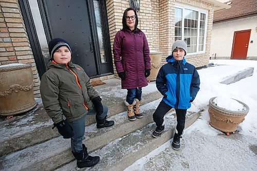 JOHN WOODS / WINNIPEG FREE PRESS
Susan Wingert, a parent and letter writing organizer who is asking the government for more information and data regarding the COVID education dashboard, is photographed with her sons Alec, 10, left, and Alden, 12, in Winnipeg, Wednesday, February 24, 2021. Despite provincial promises parents say they still arent getting the information they need to make the right decisions for their families via the new dashboard. 

Reporter: McIntosh
