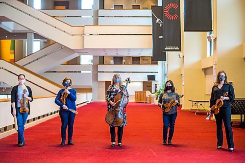 MIKAELA MACKENZIE / WINNIPEG FREE PRESS

Julie Savard (left), Gwen Hoebig, Arlene Dahl, Sonia Lazar, and Elation Pauls (the WSO baking club) pose for a portrait at the Centennial Concert Hall in Winnipeg on Friday, Feb. 26, 2021. For Holly Harris story.

Winnipeg Free Press 2021