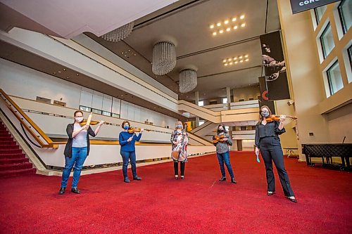 MIKAELA MACKENZIE / WINNIPEG FREE PRESS

Julie Savard (left), Gwen Hoebig, Arlene Dahl, Sonia Lazar, and Elation Pauls (the WSO baking club) pose for a portrait at the Centennial Concert Hall in Winnipeg on Friday, Feb. 26, 2021. For Holly Harris story.

Winnipeg Free Press 2021