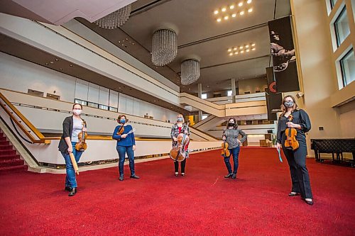 MIKAELA MACKENZIE / WINNIPEG FREE PRESS

Julie Savard (left), Gwen Hoebig, Arlene Dahl, Sonia Lazar, and Elation Pauls (the WSO baking club) pose for a portrait at the Centennial Concert Hall in Winnipeg on Friday, Feb. 26, 2021. For Holly Harris story.

Winnipeg Free Press 2021