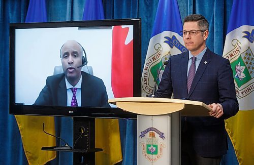 MIKE DEAL / WINNIPEG FREE PRESS
Winnipeg Mayor Brian Bowman hosts a press conference with a virtual Ahmed Hussen (pictured on monitor), federal Minister of Families, Children and Social Development, Kevin Lamoureux, Member of Parliament for Winnipeg North, and Rochelle Squires, the provincial Minister of Families, Friday morning at City Hall.
Minister Hussen announced that a joint effort by the three levels of government will help create, "18 affordable modular apartments for women and their children, including Indigenous women, experiencing homelessness or at risk of homelessness."
See Joyanne Pursaga story 
210226 - Friday, February 26, 2021.