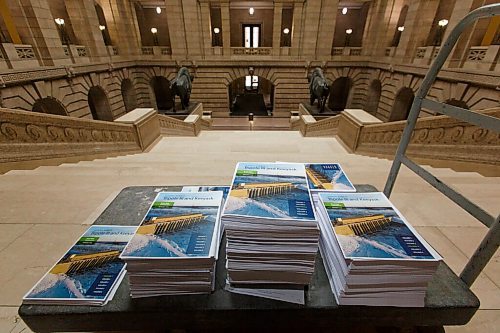 MIKE DEAL / WINNIPEG FREE PRESS
The 14,000 page Hydro Report called the Economic Review of Bipole III Keeyask Report. The document has 6 volumes and weighs in around 140lbs. Only this one copy was printed. 
210226 - Friday, February 26, 2021.