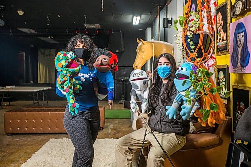 MIKAELA MACKENZIE / WINNIPEG FREE PRESS

Ava Julian (left) and Tom Elbers show some of the puppets involved in the Good Will Social Club virtual variety show in Winnipeg on Friday, Feb. 26, 2021. For Eva Wasney story.

Winnipeg Free Press 2021