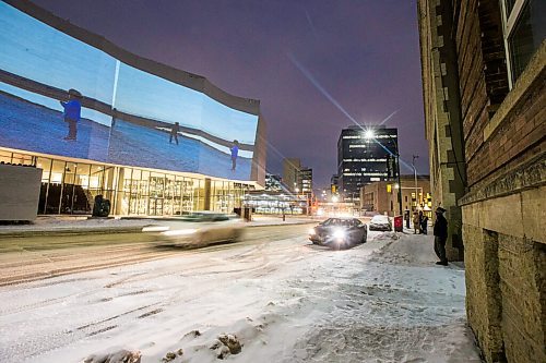 MIKAELA MACKENZIE / WINNIPEG FREE PRESS

Folks watch the projections of contemporary Inuit artwork and imagery at Qaumajuq, the Inuit art centre, in downtown Winnipeg on Friday, Feb. 26, 2021. The display will play on a loop every half hour between 6pm and 10pm on Fridays and Saturdays starting February 26 and ending March 27, as part of #Qaumajuq365, the Inuit art centres inaugural year. Standup.

Winnipeg Free Press 2021