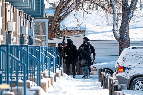 Daniel Crump / Winnipeg Free Press. Members of the Winnipeg Police Service are on scene in the 600 block of McGee Street regarding the execution of a warrant at a residence. No injuries have been reported at this time, and it is likely our presence in the area could extend into the evening. February 27, 2021.