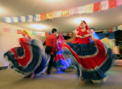 Brandon Sun 06022010 Dancers are a blur of motion as they perform at the Salvadoran Pavilion at Bethel Christian Assembly on Richmond Ave. during the 7th Annual Lieutenant Governor's Winter Festival on Saturday. (Tim Smith/Brandon Sun)