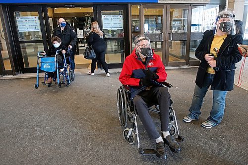 JOHN WOODS / WINNIPEG FREE PRESS
Kathy and George Freeman, 79, and other members of the general public over 95, and 75 for indigenous, were allowed to get their COVID-19 vaccinations today at the Convention Centre in Winnipeg Sunday, March 1, 2021. 

Reporter: DaSilva