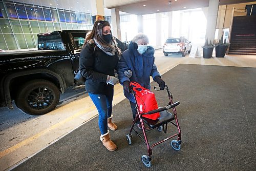 JOHN WOODS / WINNIPEG FREE PRESS
Edna Boss, 92, with assistance from her granddaughter, and other members of the general public over 95, and 75 for indigenous, were allowed to get their COVID-19 vaccinations today at the Convention Centre in Winnipeg Sunday, March 1, 2021. 

Reporter: DaSilva