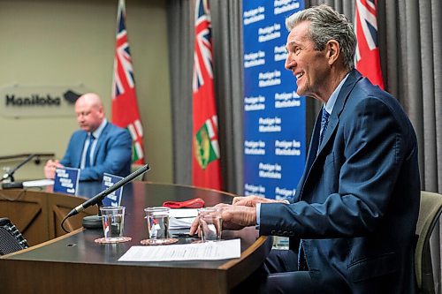 MIKAELA MACKENZIE / WINNIPEG FREE PRESS

Premier Brian Pallister (front) and chief public health officer Dr. Brent Roussin make an announcement about changes in public health orders at the Manitoba Legislative Building in Winnipeg on Tuesday, March 2, 2021. For Danielle story.

Winnipeg Free Press 2021