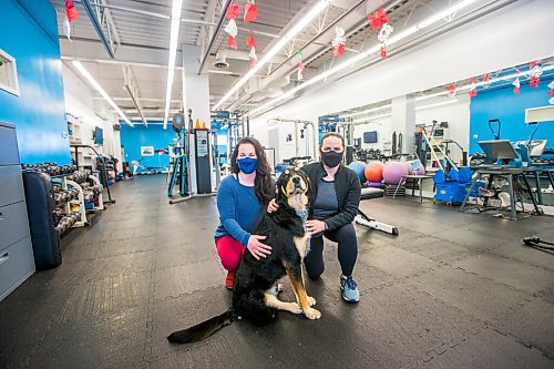 MIKAELA MACKENZIE / WINNIPEG FREE PRESS

Co-owners Chelsea White (left) and Lindsay Jurkowski pose for a portrait with gym dog, Hudson, at Advantage Conditioning in Winnipeg on Tuesday, March 2, 2021. They're happy with the extension, but are struggling with the restrictions. For Temur story.

Winnipeg Free Press 2021