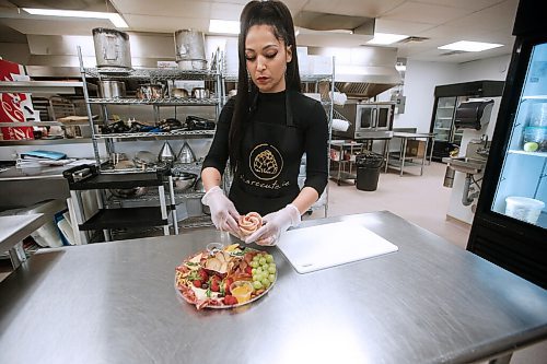 JOHN WOODS / WINNIPEG FREE PRESS
Cassandra Carreiro, a registered psychiatric nurse who has started a side business called Sharecuterie which prepares and delivers charcuterie boards, is photographed in her work kitchen in Winnipeg Tuesday, March 2, 2021. 

Reporter: Sanderson
