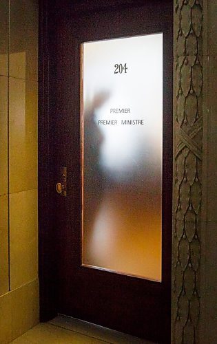 MIKE DEAL / WINNIPEG FREE PRESS
Premier Brian Pallister's silhouette appears on the other side of his office door as he begins to head towards the legislative assembly chambers as his government reconvened the third session of the 42nd legislature at the Manitoba Legislative building Wednesday. 
210303 - Wednesday, March 03, 2021.