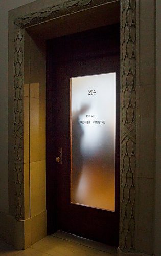 MIKE DEAL / WINNIPEG FREE PRESS
Premier Brian Pallister's silhouette appears on the other side of his office door as he begins to head towards the legislative assembly chambers as his government reconvened the third session of the 42nd legislature at the Manitoba Legislative building Wednesday. 
210303 - Wednesday, March 03, 2021.