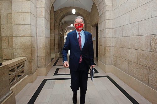 MIKE DEAL / WINNIPEG FREE PRESS
Premier Brian Pallister heads towards the legislative assembly chambers as his government reconvened the third session of the 42nd legislature at the Manitoba Legislative building Wednesday. 
210303 - Wednesday, March 03, 2021.