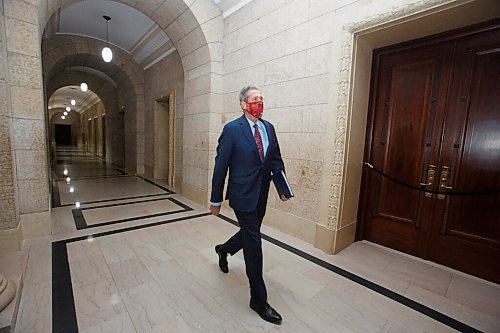 MIKE DEAL / WINNIPEG FREE PRESS
Premier Brian Pallister heads towards the legislative assembly chambers as his government reconvened the third session of the 42nd legislature at the Manitoba Legislative building Wednesday. 
210303 - Wednesday, March 03, 2021.