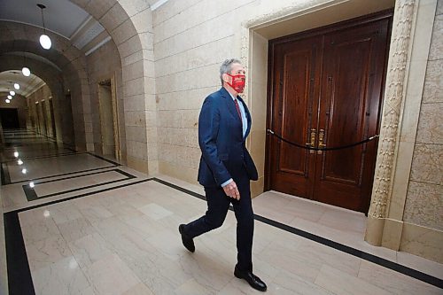 MIKE DEAL / WINNIPEG FREE PRESS
Premier Brian Pallister heads towards the legislative assembly chambers as his government reconvened the third session of the 42nd legislature at the Manitoba Legislative building Wednesday. 
210303 - Wednesday, March 03, 2021.