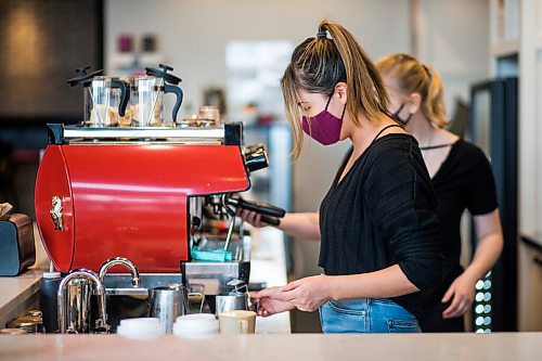 MIKAELA MACKENZIE / WINNIPEG FREE PRESS

Summer Catcheway makes a latte at Good Earth Coffeehouse on Sterling Lyon Parkway in Winnipeg on Wednesday, March 3, 2021. For Temur story.

Winnipeg Free Press 2021
