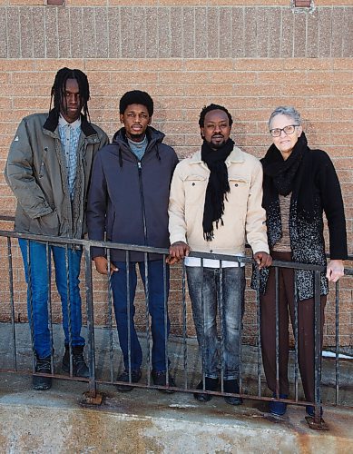 MIKE DEAL / WINNIPEG FREE PRESS
Karin Gordon, house host at Hospitality House
with a few new immigrants (from left): Kelly Uwintwari, Abdoulhi Muhammad, and Benon Tumusiime. Newcomers to Manitoba and their support groups have found increasing difficulty due to COVID.
see Malak Abas story
210304 - Thursday, March 04, 2021.