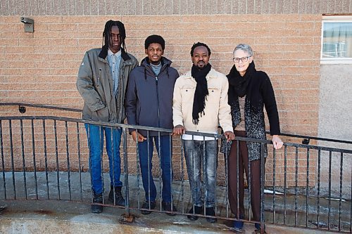 MIKE DEAL / WINNIPEG FREE PRESS
Karin Gordon, house host at Hospitality House
with a few new immigrants (from left): Kelly Uwintwari, Abdoulhi Muhammad, and Benon Tumusiime. Newcomers to Manitoba and their support groups have found increasing difficulty due to COVID.
see Malak Abas story
210304 - Thursday, March 04, 2021.