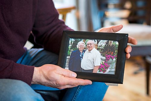 MIKAELA MACKENZIE / WINNIPEG FREE PRESS

Jim Friesen, son of Elisabeth Friesen (who died of COVID-19 at the Rest Haven Nursing Home in November), poses for a portrait with a photo of his mother in Winnipeg on Thursday, March 4, 2021. For Kevin story.

Winnipeg Free Press 2021