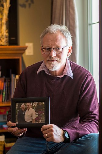 MIKAELA MACKENZIE / WINNIPEG FREE PRESS

Jim Friesen, son of Elisabeth Friesen (who died of COVID-19 at the Rest Haven Nursing Home in November), poses for a portrait with a photo of his mother in Winnipeg on Thursday, March 4, 2021. For Kevin story.

Winnipeg Free Press 2021