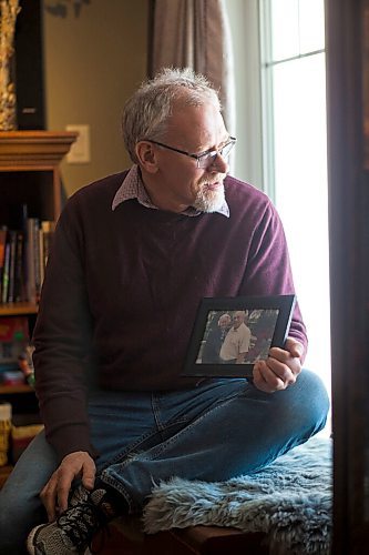 MIKAELA MACKENZIE / WINNIPEG FREE PRESS

Jim Friesen, son of Elisabeth Friesen (who died of COVID-19 at the Rest Haven Nursing Home in November), poses for a portrait with a photo of his mother in Winnipeg on Thursday, March 4, 2021. For Kevin story.

Winnipeg Free Press 2021