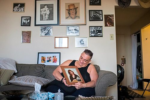 MIKAELA MACKENZIE / WINNIPEG FREE PRESS

Chet Breau (son of Valerie St.Germain, who died of COVID-19) poses for a portrait with a photo of his mother in Winnipeg on Friday, March 5, 2021. For Kevin story.

Winnipeg Free Press 2021