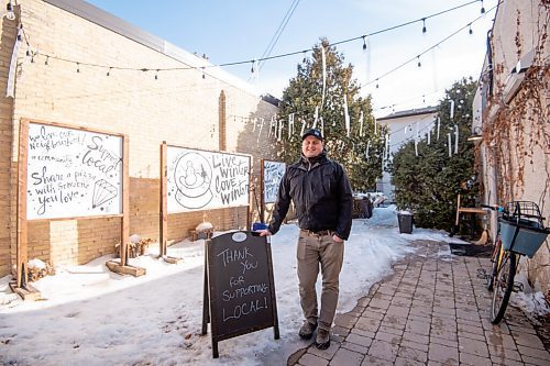 MIKE SUDOMA / WINNIPEG FREE PRESS 
Jamie Hilland an owner of the Ruby West coffee shop in front of the cafés temporary patio Friday afternoon
March 5, 2021