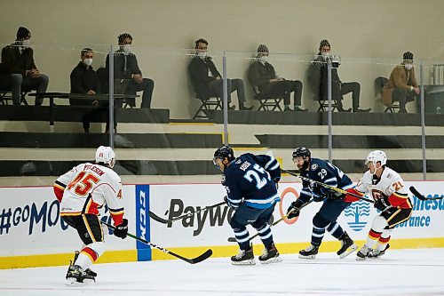 JOHN WOODS / WINNIPEG FREE PRESS
Manitoba Moose and Stockton Heat play at the Iceplex  during first period AHL action in Winnipeg on Monday, March 8, 2021.

Reporter: Allen