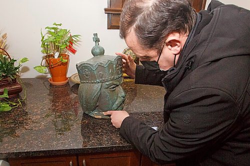 MIKE DEAL / WINNIPEG FREE PRESS
Father Ihor Shved, Ukrainian Catholic Metropolitan Cathedral of Sts. Vladimir and Olga (115 McGregor Street) looks at the head of the statue of St. Volodymyr that was the subject of vandals in 2019. It might get a new life because of a new GoFundMe campaign. 
The statue of St. Volodymyr was made by the Winnipeg artist Leo Mol (1915-2009), and was blessed by Pope John Paul II in 1984.
See Malak Abas story
210309 - Tuesday, March 09, 2021.