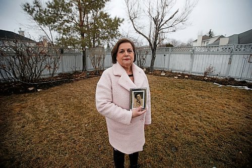JOHN WOODS / WINNIPEG FREE PRESS
Eddie Calisto-Tavares holds a photo of her father Manuel Calisto who died at Maples Personal Care Home of COVID-19 as she is photographed at her home in Winnipeg Tuesday, March 9, 2021. 

Reporter: Thorpe