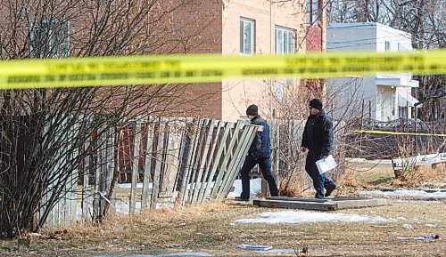 MIKE DEAL / WINNIPEG FREE PRESS
Winnipeg police forensics officers at a taped off scene at 596 Stella Avenue Wednesday afternoon.
210310 - Wednesday, March 10, 2021.