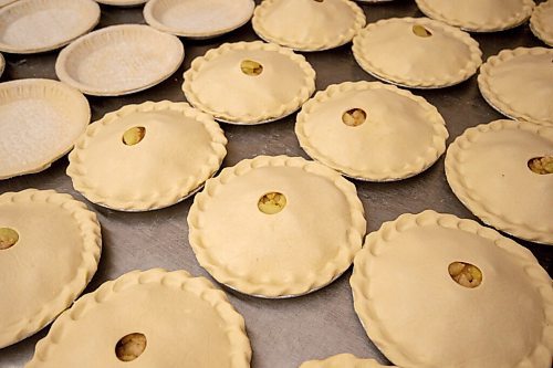 MIKE SUDOMA / WINNIPEG FREE PRESS
Dozens of apple pies wait to get put into the oven for a commercial client of Goodies Bake Shop Wednesday morning
March 10, 2021
