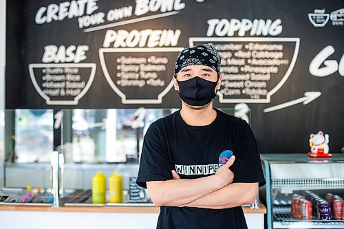 MIKAELA MACKENZIE / WINNIPEG FREE PRESS

Zhehong Wen, owner of Poke Mono, poses for a portrait at his restaurant (which opened on the eve of the pandemic shutdown) in Winnipeg on Thursday, March 11, 2021. For Ben Waldman story.

Winnipeg Free Press 2021