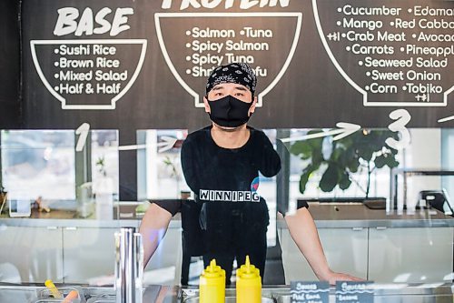 MIKAELA MACKENZIE / WINNIPEG FREE PRESS

Zhehong Wen, owner of Poke Mono, poses for a portrait at his restaurant (which opened on the eve of the pandemic shutdown) in Winnipeg on Thursday, March 11, 2021. For Ben Waldman story.

Winnipeg Free Press 2021