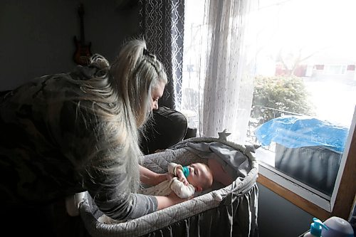 JOHN WOODS / WINNIPEG FREE PRESS
Ashleigh McMullen cares for her son Lachlan, 4 months, in their home in Winnipeg Thursday, March 11, 2021. McMullen, a mother of two, including a 4-month old son, Lachlan, who has a severe heart condition, is calling the COVID-19 rules that doctor's appointments only have one person - even if the other person lives in the same residence or is a doula/caregiver - "traumatic.

Reporter: Abas