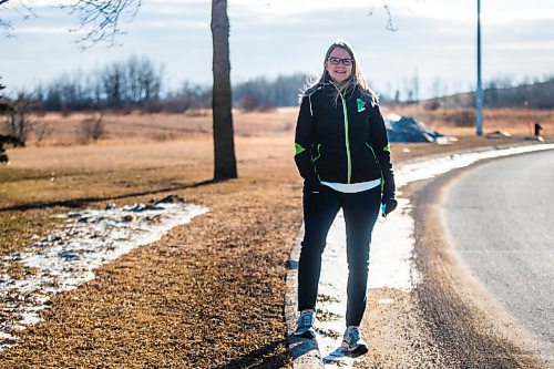 MIKAELA MACKENZIE / WINNIPEG FREE PRESS

Manitoba Runners Association (MRA) executive director Kathy Wiens poses for a portrait on the road outside of her home in Winnipeg on Thursday, March 11, 2021. For Taylor Allen story.

Winnipeg Free Press 2021